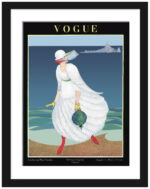1916 Vogue cover print featuring a woman in a white dress on a beach.