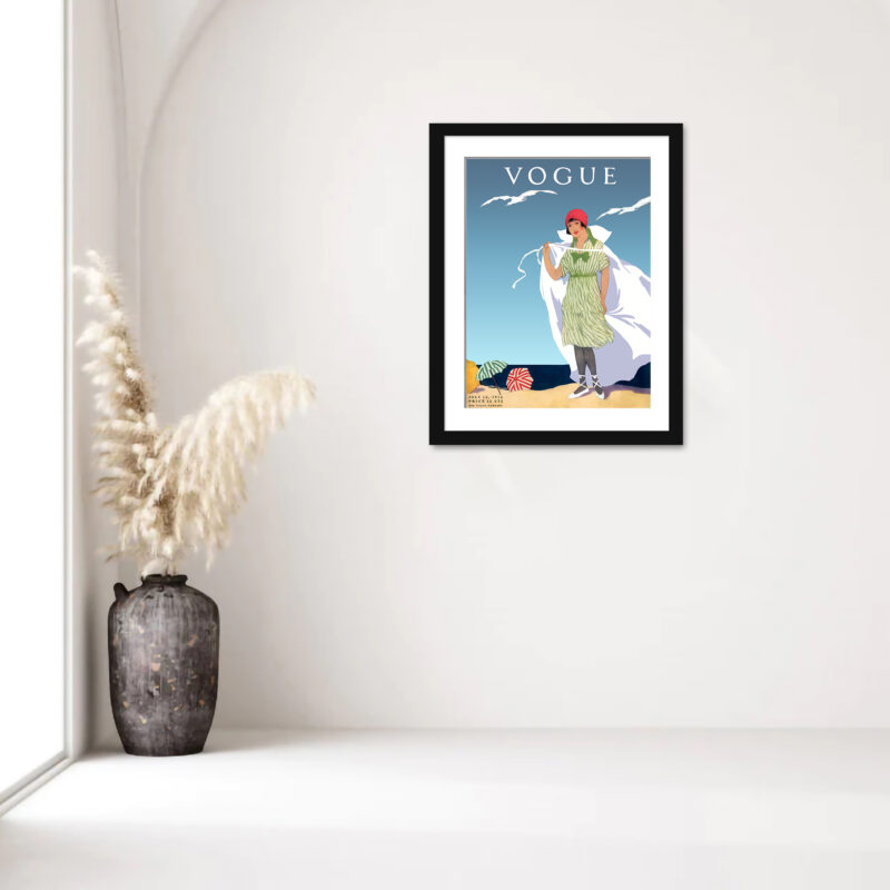 1912 Vogue cover with a woman on a beach and seagulls.