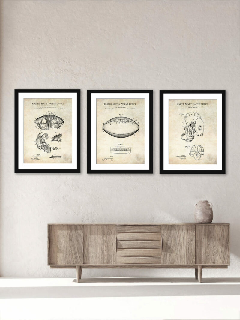 Collection of three vintage football patent prints, including a jacket, helmet, and game ball.
