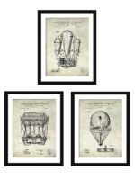 Set of three vintage airship patent prints framed on a wall.