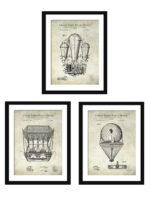 Set of three vintage airship patent prints framed on a wall.