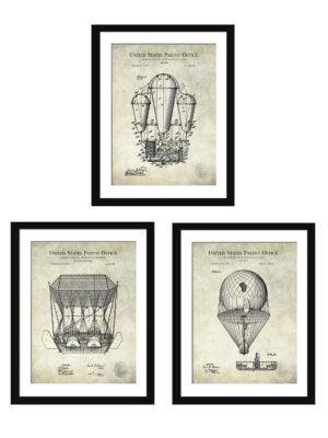 Set of three vintage airship patent prints framed on a wall.
