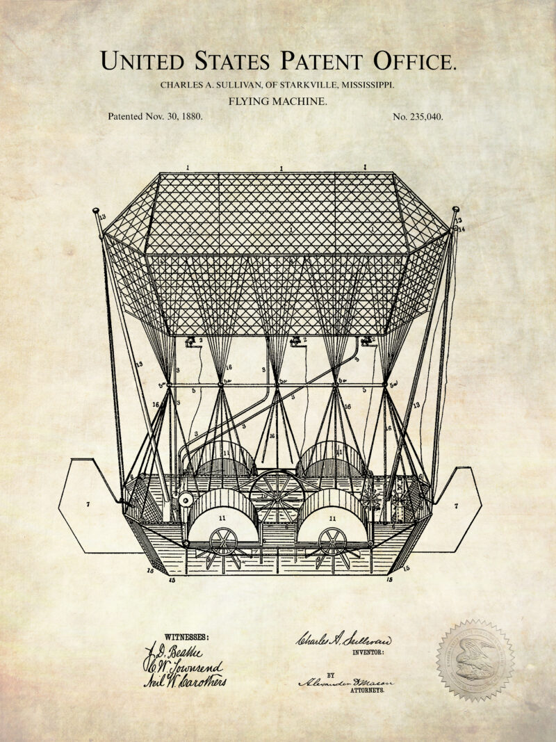 Set of three vintage airship patent prints framed on a wall.